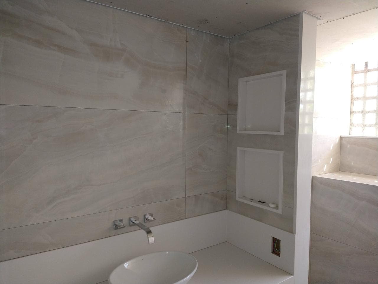 Acabamento em porcelanato executado pela Gilberto Construtor
